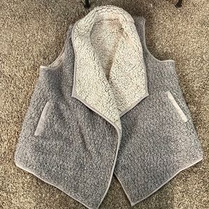 Super soft and fluffy reversible sherpa vest